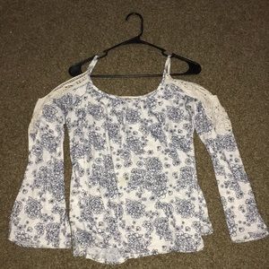 Floral blouse off the shoulders with thin straps